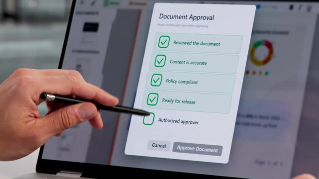 Hispanic Man Using Cloud-Based Software To Review And Approve Documents