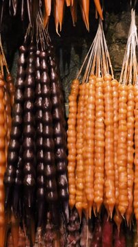 Colorful Churchkhela Hanging In Shop. Churchkhela Is A Traditional Georgian Food