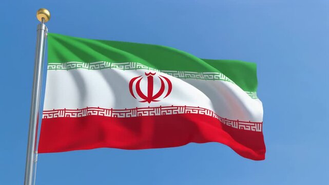 "A symbolic photograph of the national flag of Iran waving against a clear blue sky. The flag consists of three horizontal bands: green at the top, white in the middle, and red at the bottom. In the c