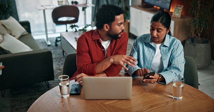 Laptop, cellphone and couple in home with online banking for property investment, bills or mortgage. Technology, discussion and man with woman on computer for loan application together in house.