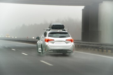 Fototapeta premium Vehicle with roof rack and cargo storage on trip