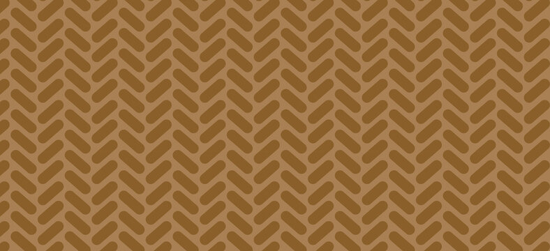 Golden brown herringbone parquet pattern background with geometric woven texture for professional interior design or classic luxury backdrop