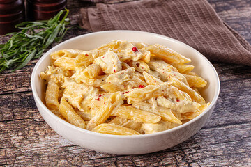 Creamy pasta Alfredo with chicken © Andrei Starostin