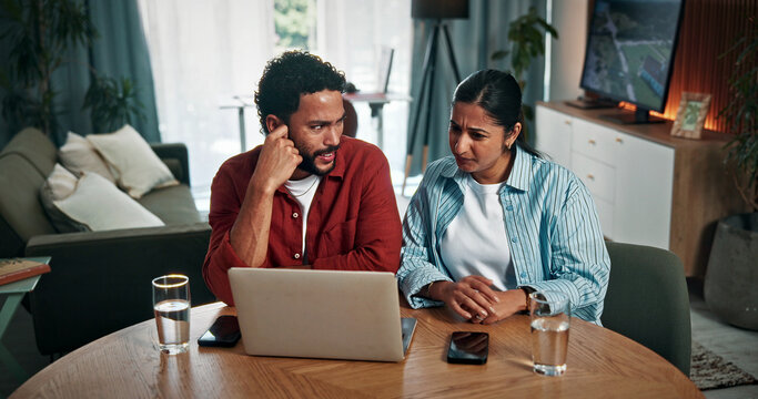 Laptop, confused and couple in home with online banking for property investment, bills or mortgage. Technology, discussion and man with woman on computer for loan application decline in house.