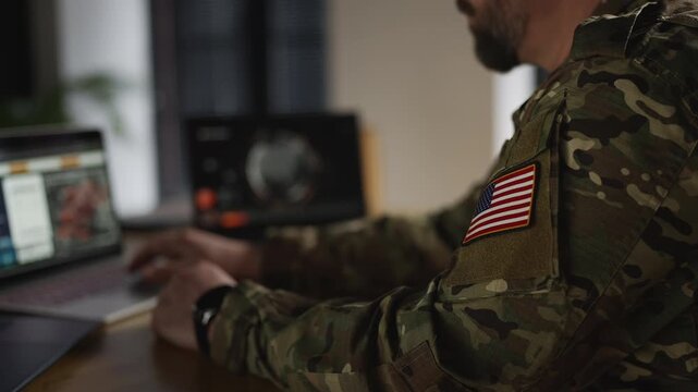 American military intelligence officer analyzing satellite data for surveillance