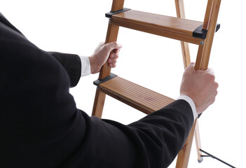 Businessman climbing ladder on white background, closeup © New Africa