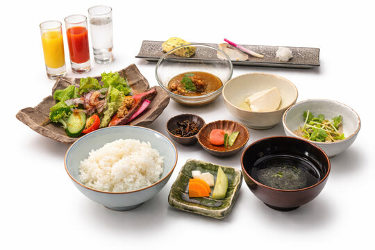 Traditional Japanese Breakfast Set with White Rice, Soup, and Assorted Side Dishes