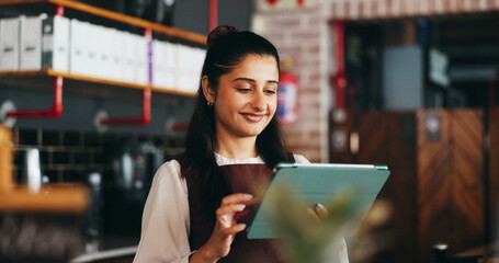 Planning, happy and woman on tablet in restaurant for online inventory, website and orders. Small...