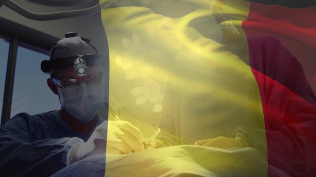 Vertical video: After prep surgeon in scrubs operating on patient in OR, tricolor flag, copy space