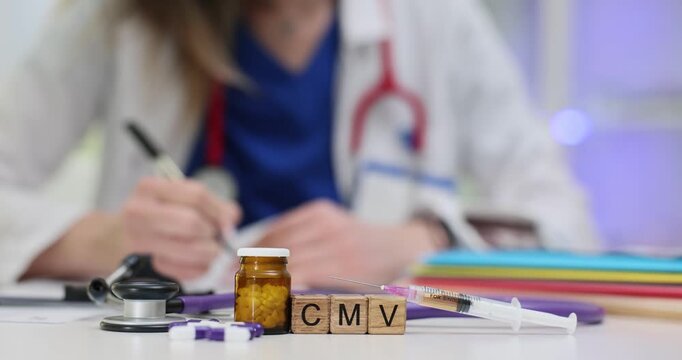 Wooden cubes arranged on table form abbreviation CMV by syringe filled with medication. Woman doctor carefully studies patient documents for treatment