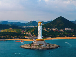Naklejka premium Aerial view of statue GuanYin at seaside in Nanshan buddhism center of Sanya, Hainan island China