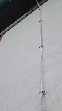 Tilting down of lightning rod disconnected and wired with copper