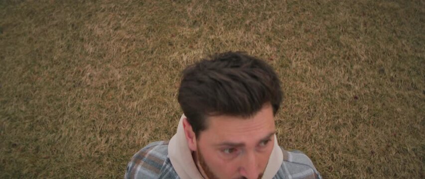 Person inhales fresh air outdoors, An individual is actively inhaling and exhaling fresh outdoor air currently