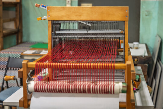 Rhythmic loom creates a vibrant tapestry, workshop and crafts
