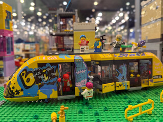 Obraz premium Graffiti yellow lego tram with minifigures