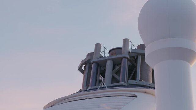 Cruise Ship Satellite Radome and Exhaust Stack at Early Morning, Copy space