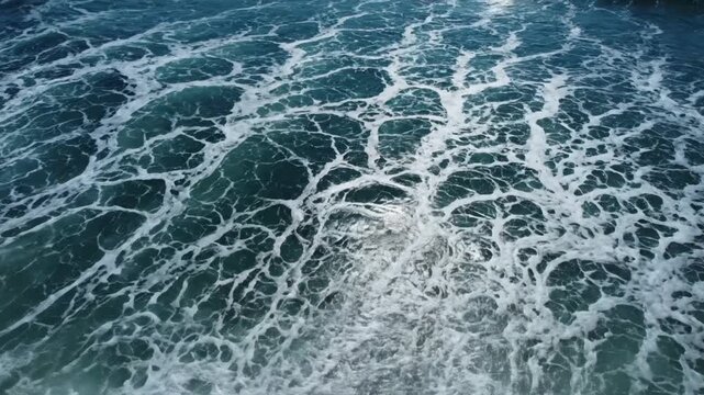 Aerial view of gurgling ocean churning and moving creating an interesting background texture, ocean movement texture background