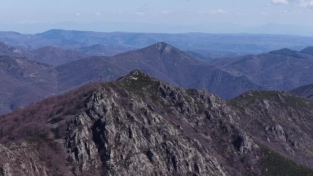 Drone captures textured rock formation along narrow ridge with steep sides in Montpezat-sous-Bauzon, Ard&egrave;che, France