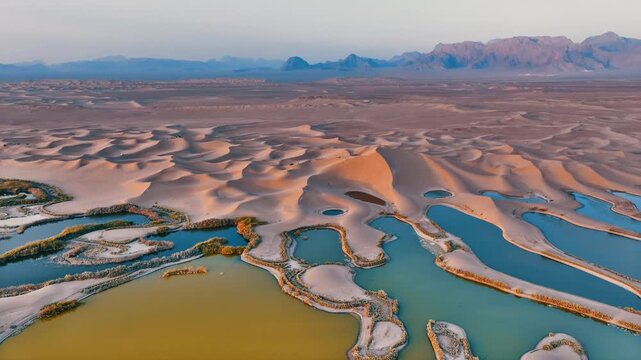 a magical colorful lake in the heart of desert -iran