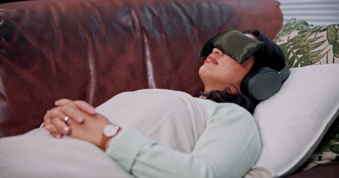 Headphones, counseling or woman on sofa with eye mask for sensory deprivation, microdosing or PTSD. Sleep, psilocybin and person with cushion blindfold for anxiety, emotion regulation and psychology