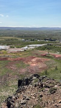 Wide shot of Haukadalur geothermal valley with geysers and hot springs, Golden Circle, Iceland