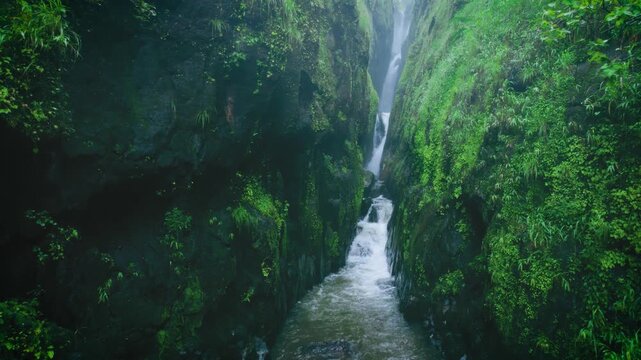 4K Aerial view of Saatsada waterfall in narrow valley in Sahyadri mountain range, Maharashtra, India. Nature landscape. travel, holidays, vacation, trekking and adventure concept. 