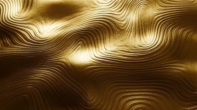 Slow pan tracking close up of metallic gold texture flowing and undulating across sculpted surface in studio backdrop
