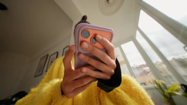 Teen With Pink Phone Case. Caucasian Teenager Using Mobile Phone With Pink Cover In Natural Light