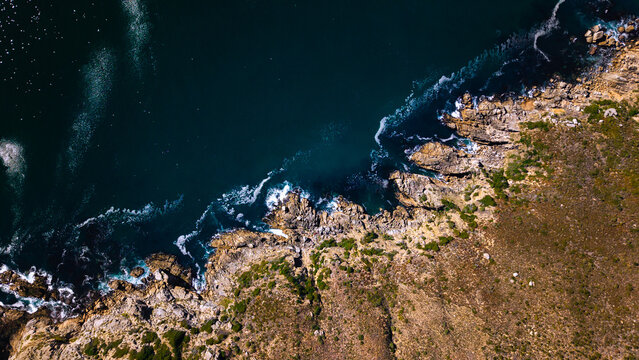 Aerial view of rocky coastline and ocean waves Cape Town