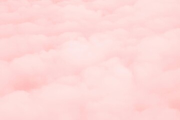 Fototapeta premium Soft pink pastel clouds drift across a vintage watercolor sky texture with a light grunge paper pattern for a romantic rose-colored nature wallpaper design