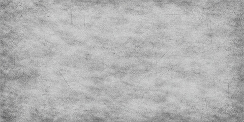 Fototapeta premium A dark and aged grey grunge paper texture featuring a rough, dirty surface pattern with a vintage charcoal cement backdrop for a textured stone or metal wallpaper design