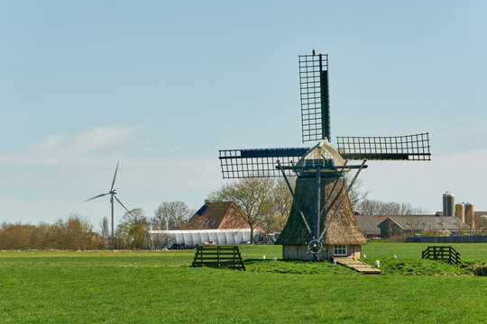 Sustainable Energy Transition Windmill And Wind Turbine In Oostereind Friesland Netherlands Representing Renewable Energy And Traditional Dutch Landscape