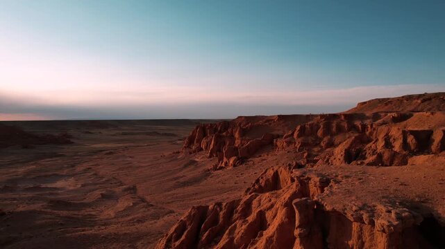 Aerial View Of Flaming Cliffs In Mongolia Gobi Desert At Sunset