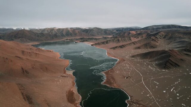 Aerial Scene Of Dund Lake Bayan Ulgii Mongolia With Rugged Peaks
