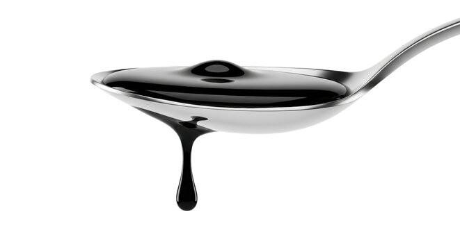 Reflective silver tablespoon holding thick, highly viscous pure-black liquid oil, isolated against a high-key white background in hyper-detailed macro. Concept of material quality and precision