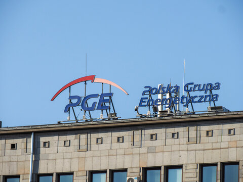PGE Polska Grupa Energetyczna corporate logo on top of a gray office building