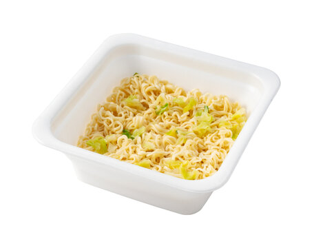 Instant yakisoba noodles with cabbage in a square styrofoam container isolated on white background