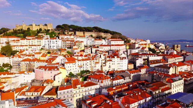 Pull out Shot of Alfama District and Castelo de Sao Jorge Lisbon in Warm Light