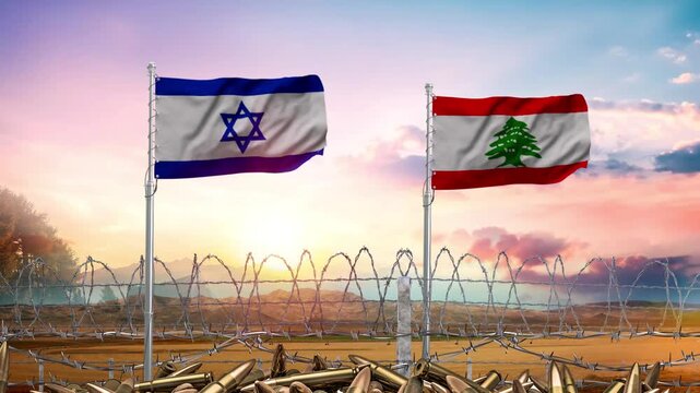 Israeli and Lebanese flags waving near the barbed wire border