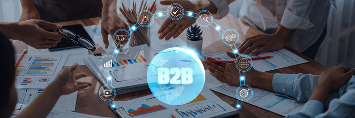 A vibrant meeting scene showcasing professionals engaged in a B2B strategy discussion, surrounded by charts and digital icons that symbolize business growth and innovation. Trope