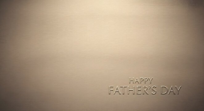 A blurry image with a beige background and a dark embossed logo or text at the bottom right corner