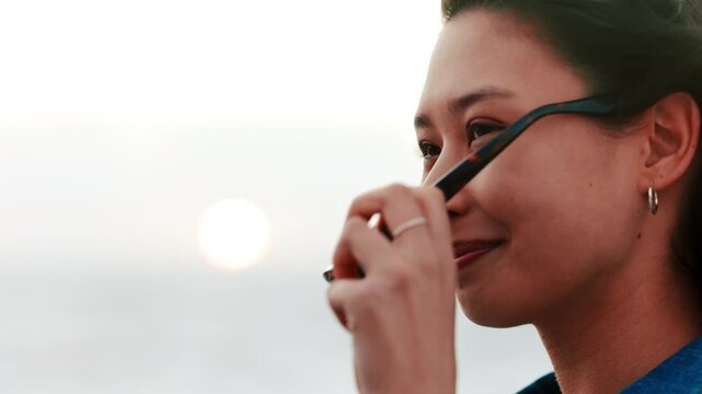 Happy, woman and sunglasses outdoor with summer holiday, peace and thinking for wellness on getaway. Space, person smile and shades with reflection, remember memory and nostalgia for vacation view.