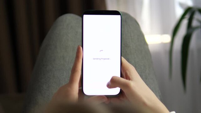 Close-up of managing influencer marketing on a smartphone. Tapping Request Collaboration on a fitness creator profile with high engagement. Professional visual for startup, social media business, and