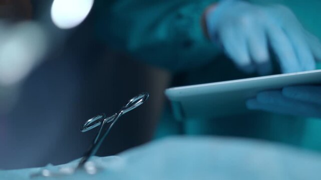 Close up of woman hand using computer mouse on computer in business environment