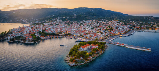 Panoramic aerial view of the town of Skiathos island, Sporades, Greece, during summer sunset time