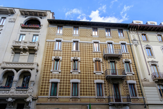 Old residential building along Via Mascheroni in Milan, Italy.