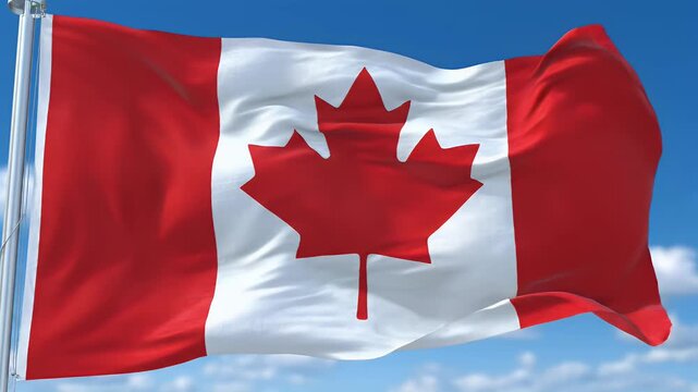 A red and white flag with a maple leaf emblem flutters against a blue sky