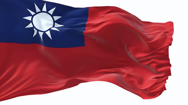 A red and blue flag with a white sun emblem is rippling in the wind