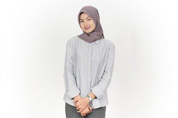 Fototapeta premium Beautiful Asian Muslim Woman Smiling Standing Over White Background