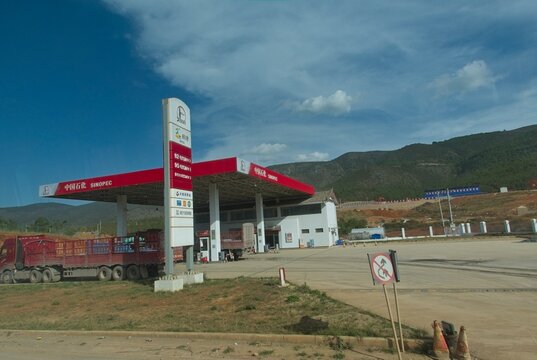LIJIANG, YUNNAN, CHINA &ndash; 19 OCTOBER 2017: Exterior view of a Sinopec gas station in a mountainous region of Yunnan. Sinopec is the world's largest oil refining conglomerate, headquartered in Beijing.